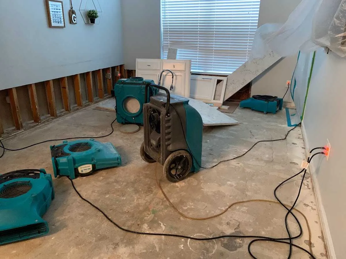 Dehumidifier in flood-cut room for Water Damage Restoration in Eagle Pass